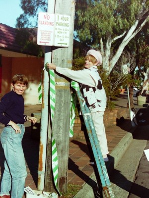 1996_04_20-Neg-17-Adrienne-Kabos-and-Sue-Randle-tying-Cables-Underground-banner-Castlecrag-525x700.jpg